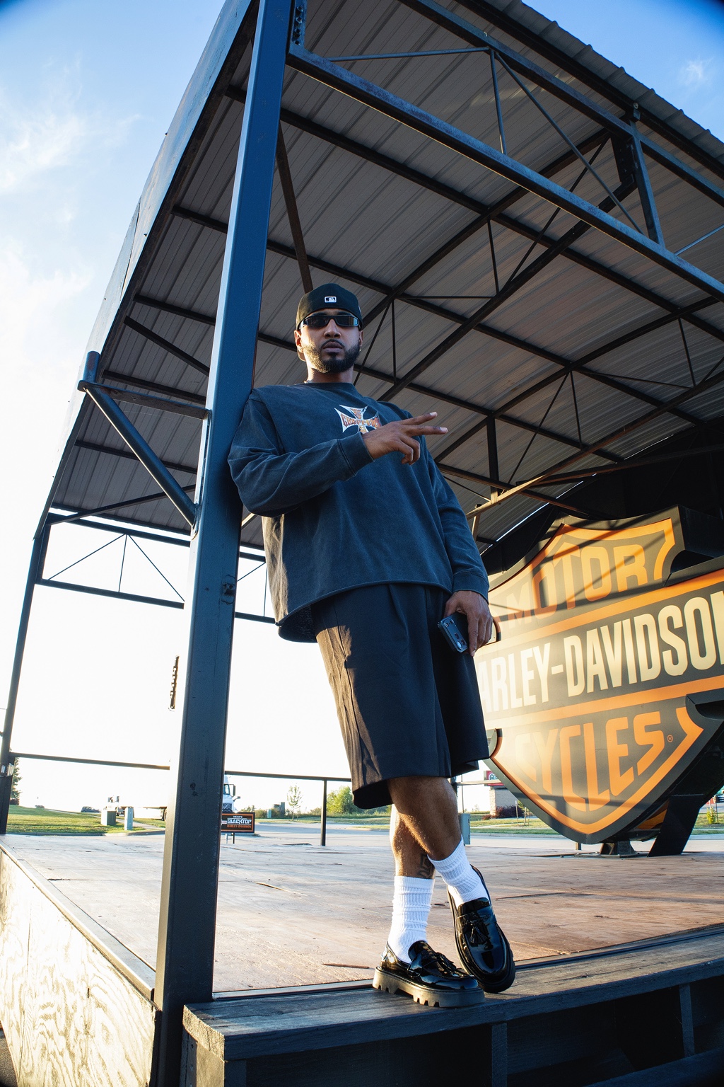 Men's lifestyle portrait outside a Harley-Davidson location